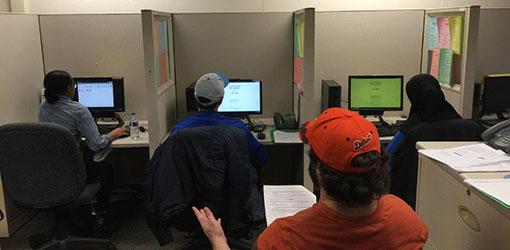 Survey Lab Researchers at PCs